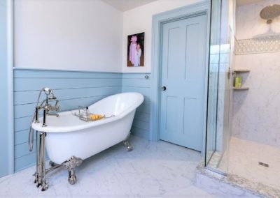 century farmhouse bathroom remodel with freestanding tub