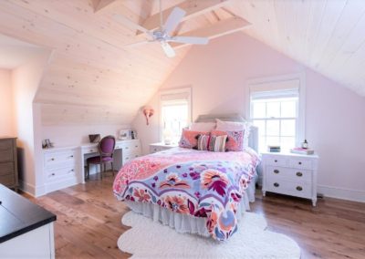 bedroom with vaulted wood ceiling