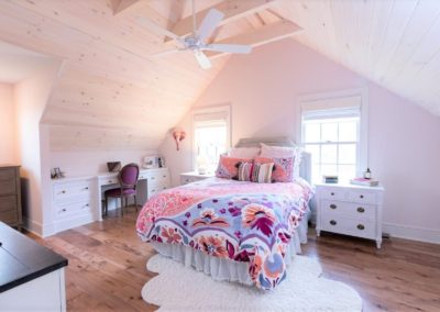 bedroom with vaulted wood ceiling
