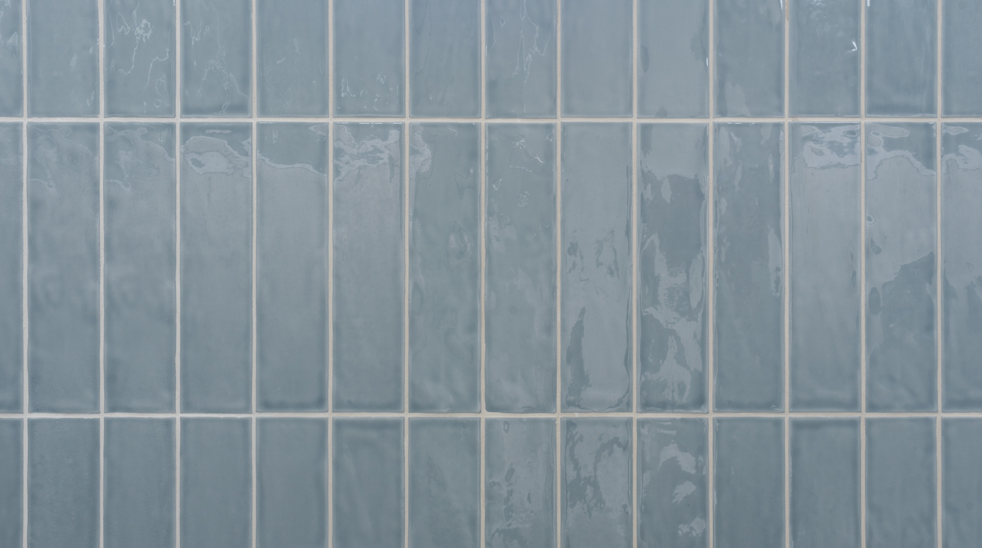 blue subway tile in shower