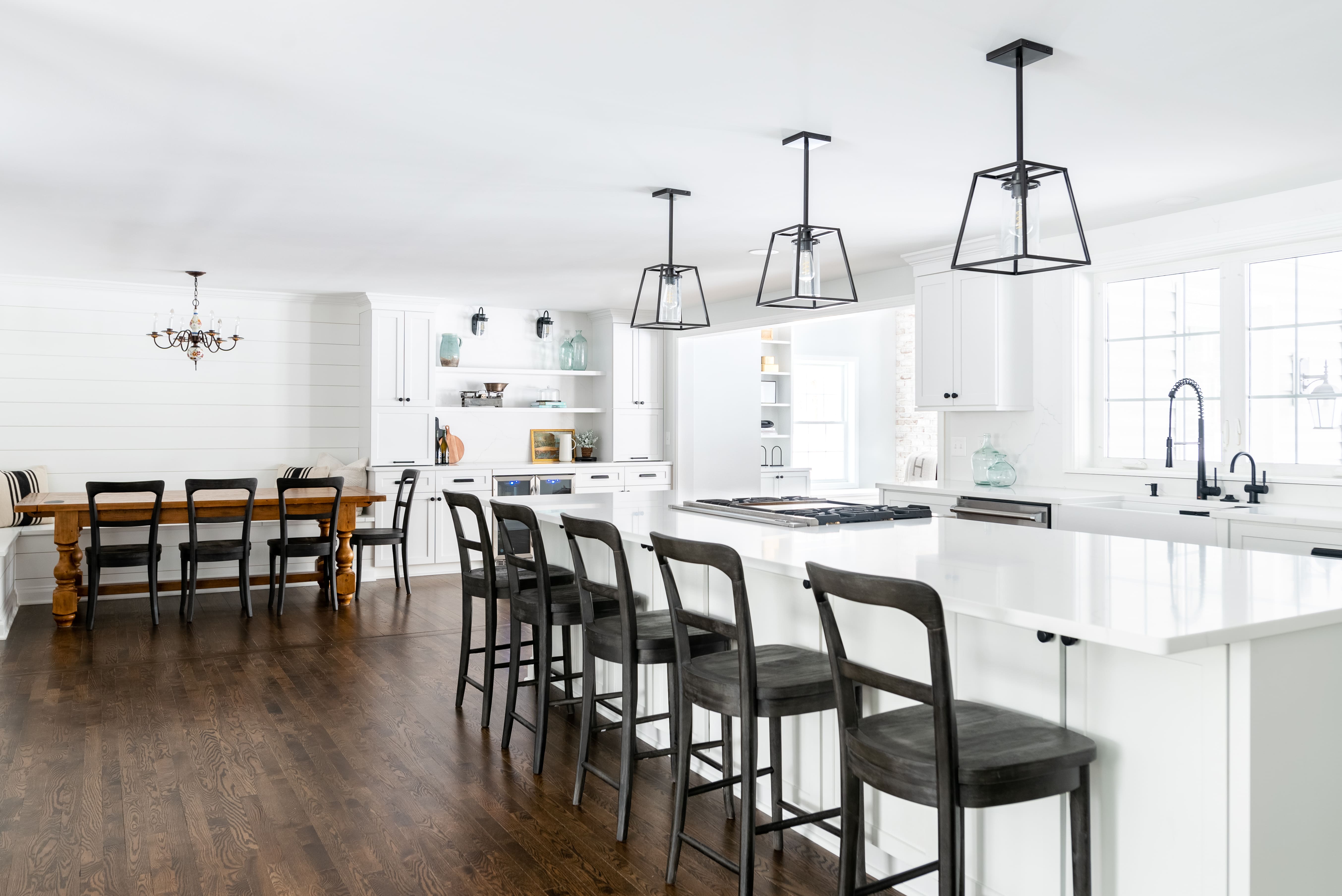 White Kitchen Island with Bar Seating in Remodeled Ohio Home