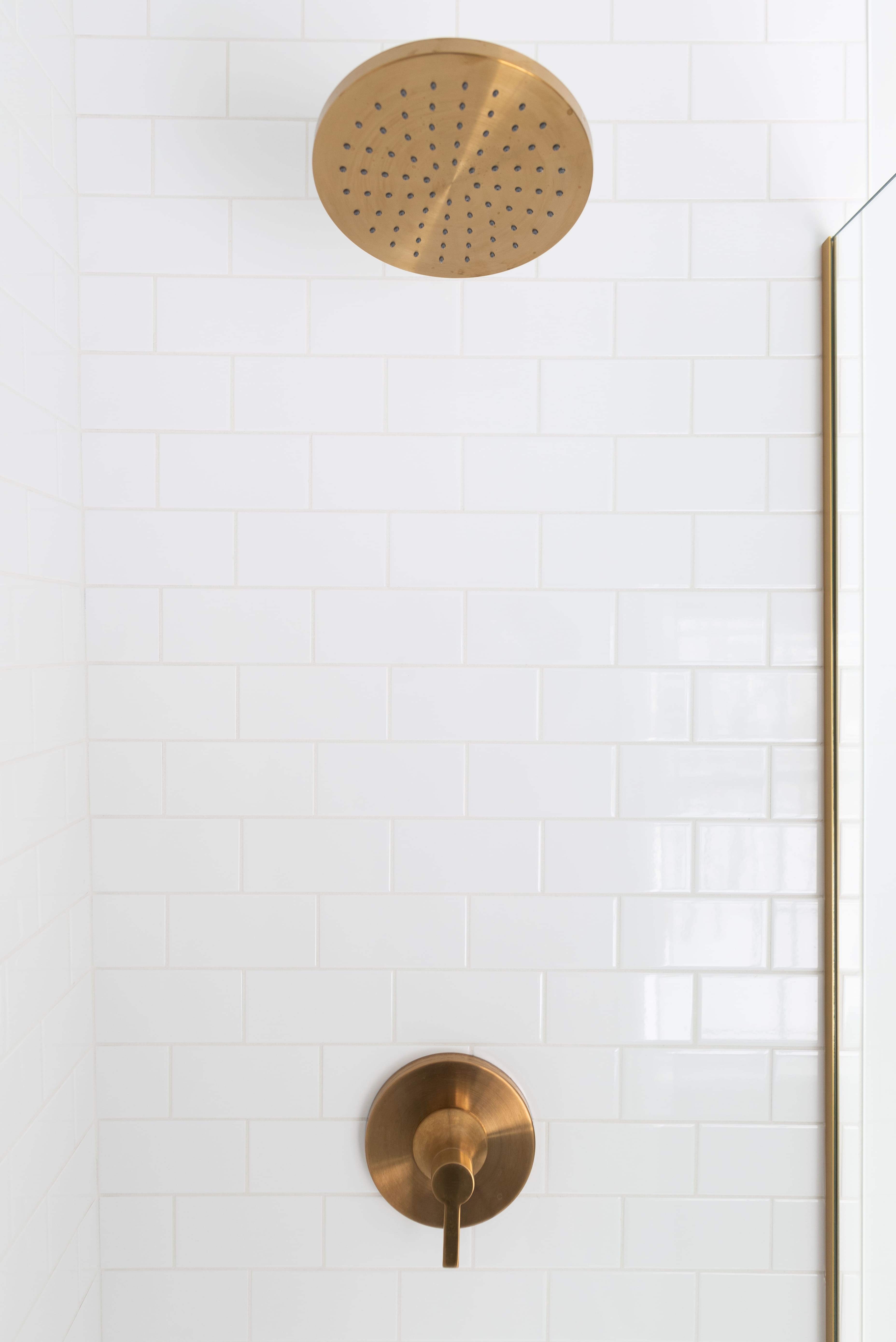 white subway tile shower in home remodel