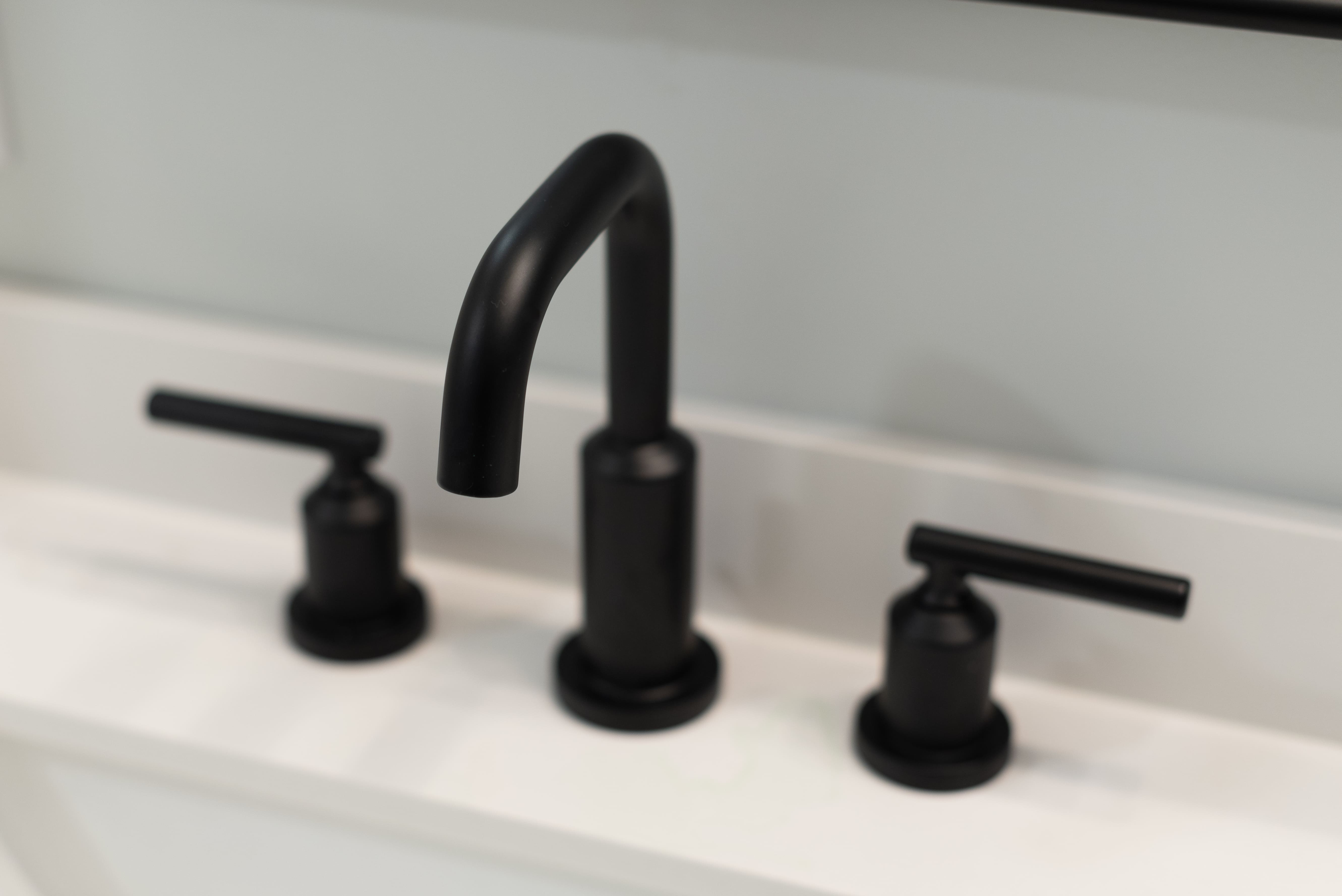 black bathroom faucet in bathroom renovation ohio