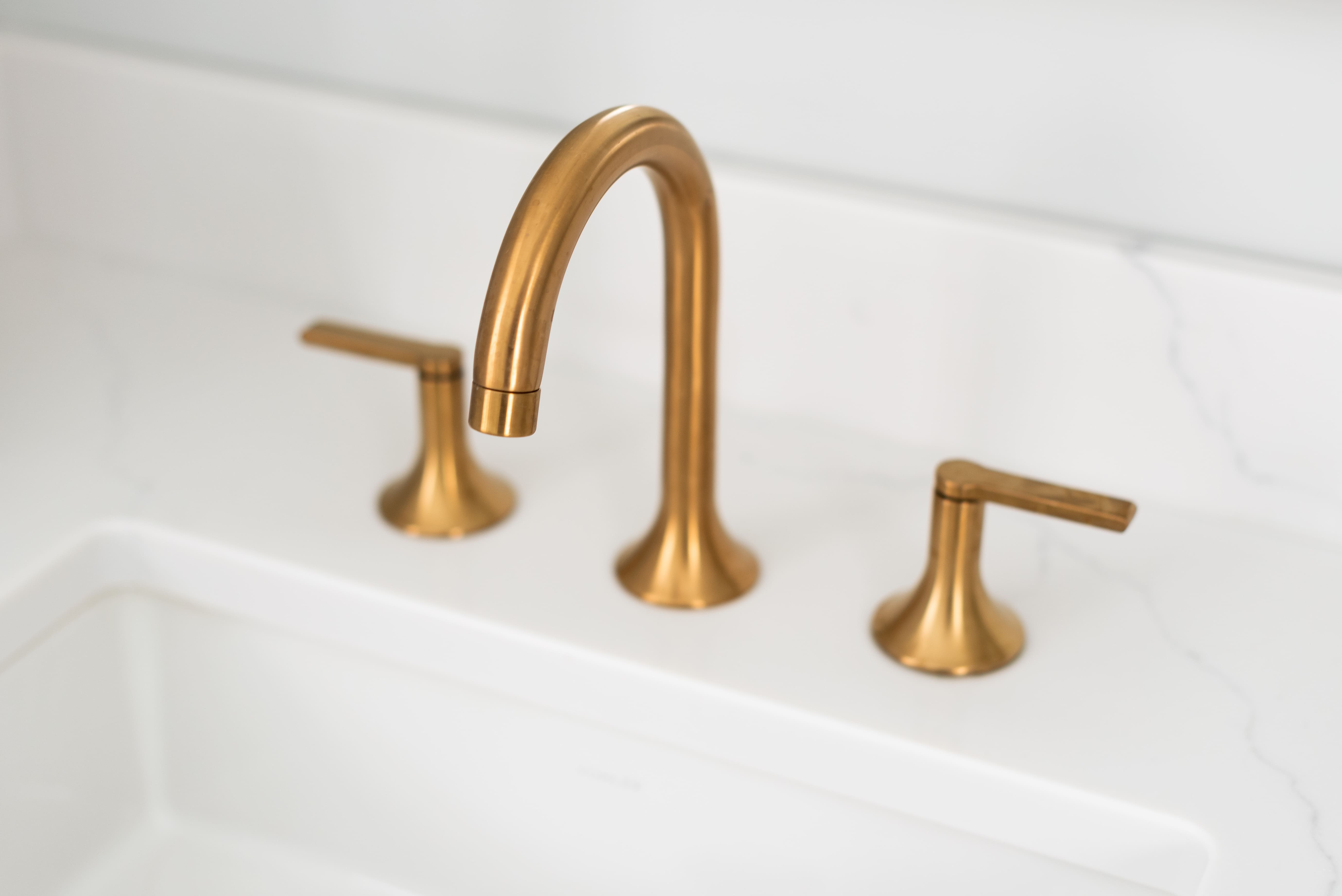 gold bathroom faucet in cleveland ohio remodel