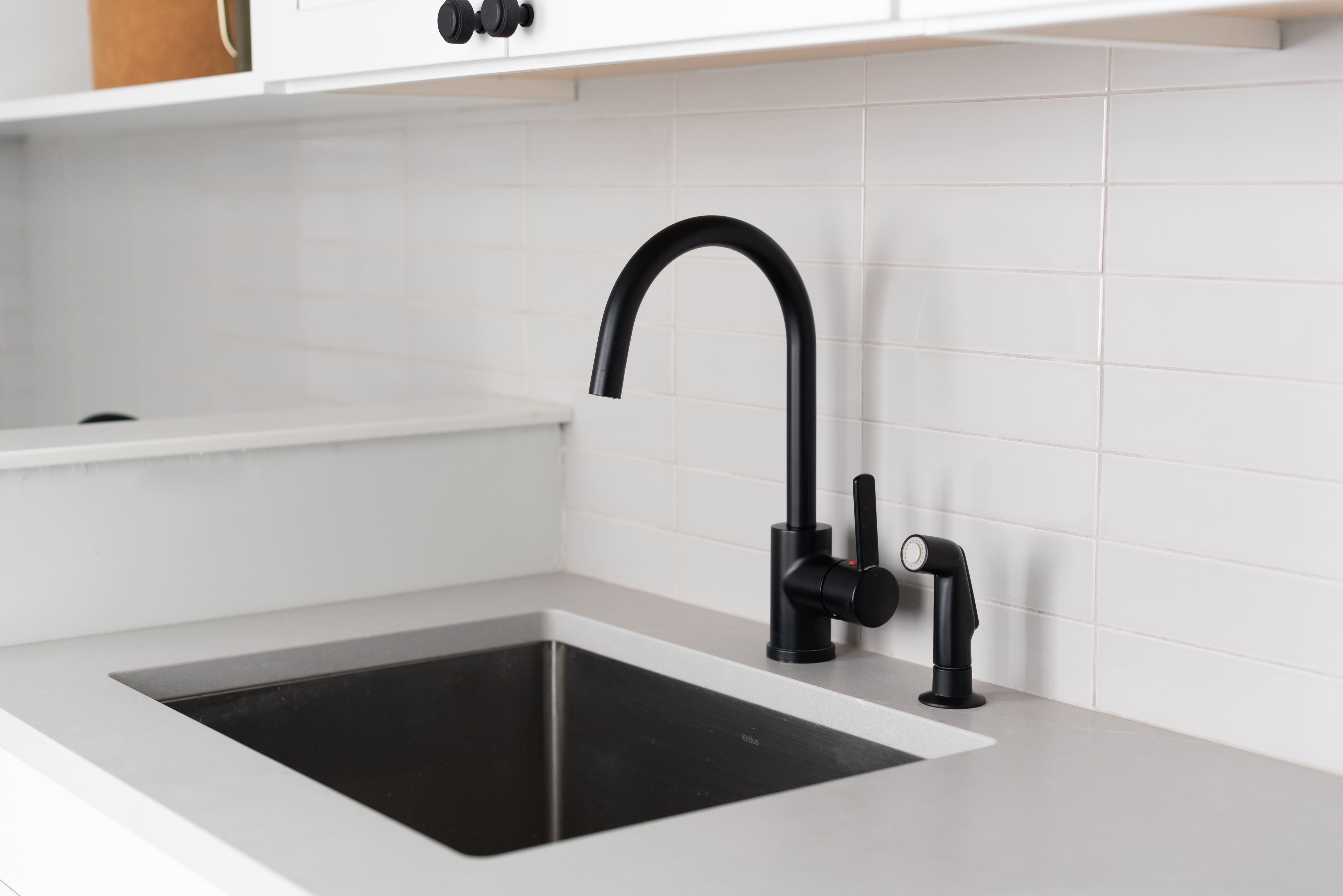 black kitchen faucet detail in ohio renovation