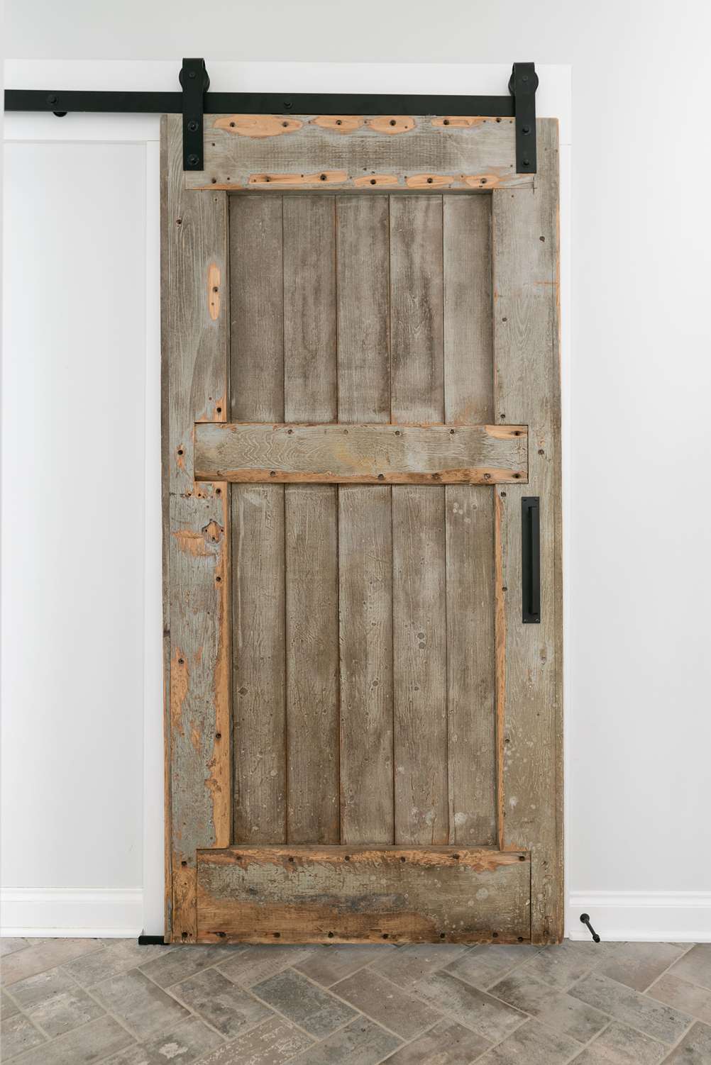 rustic wooden barn door in ohio remodel