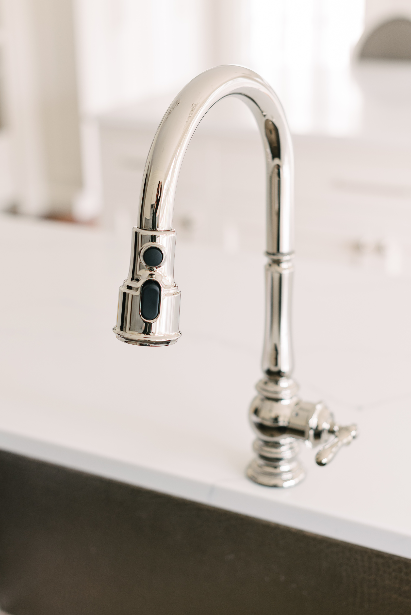 Silver kitchen faucet