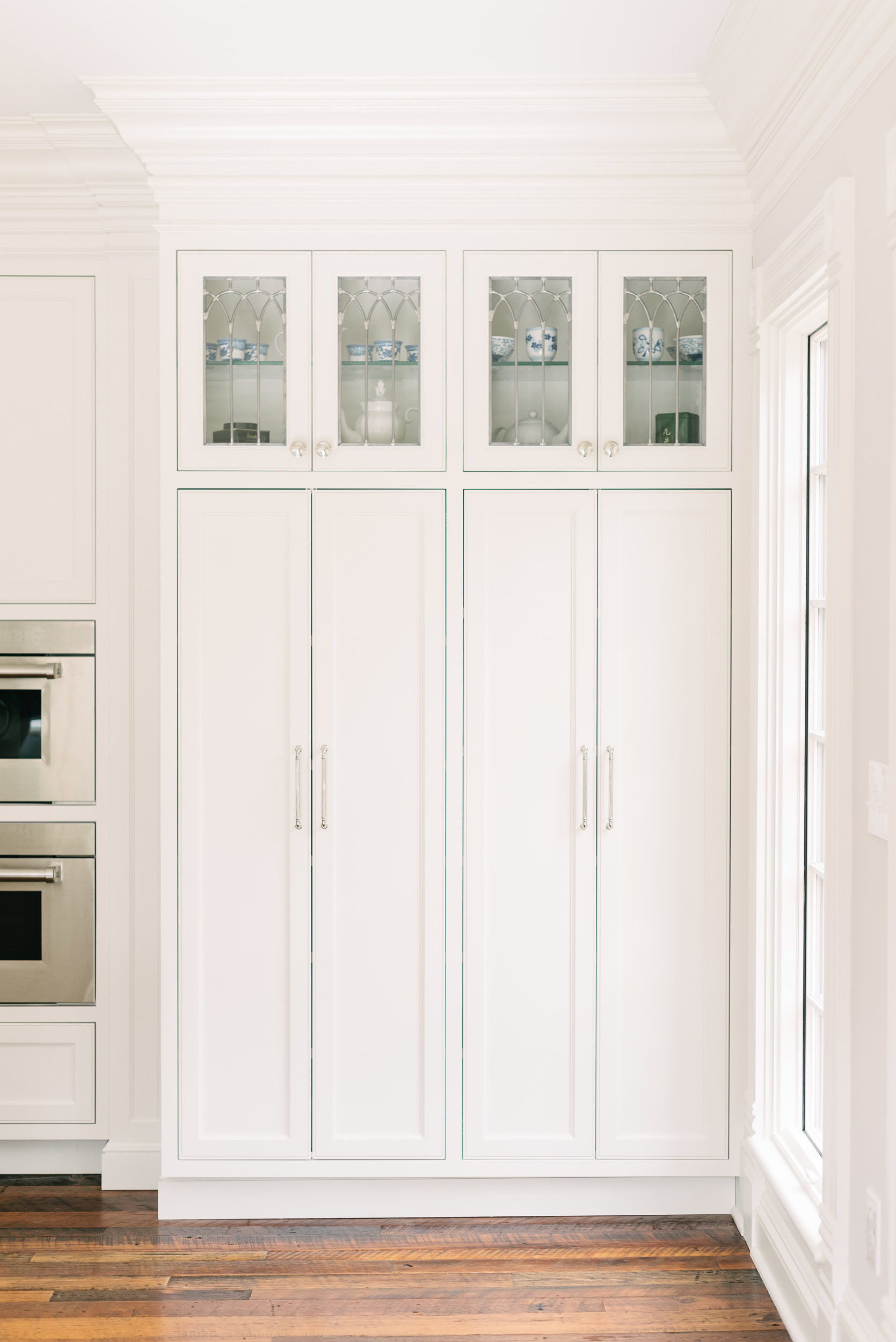 white tall kitchen cabinets